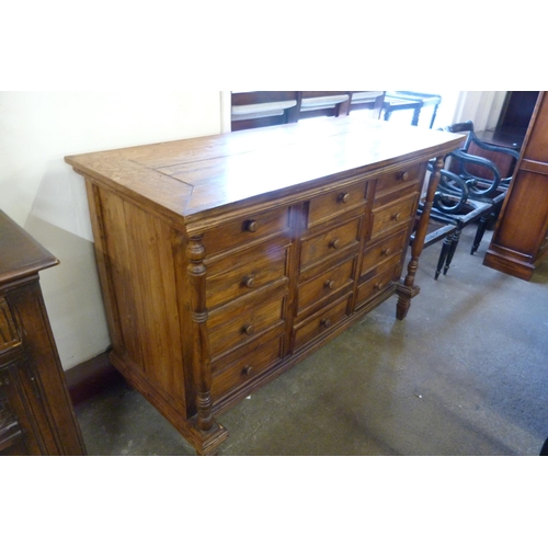 125 - A French style hardwood chest of drawers