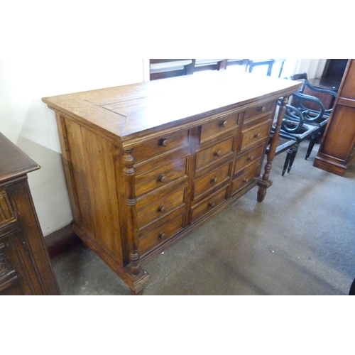 125 - A French style hardwood chest of drawers