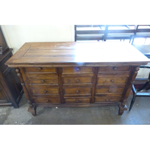 125 - A French style hardwood chest of drawers