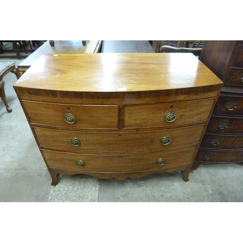 135 - A George III mahogany bow front chest of drawers