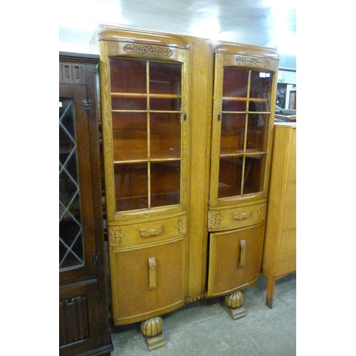 139 - A carved oak four door bookcase