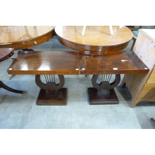 184 - A pair of Art Deco style simulated rosewood lamp tables