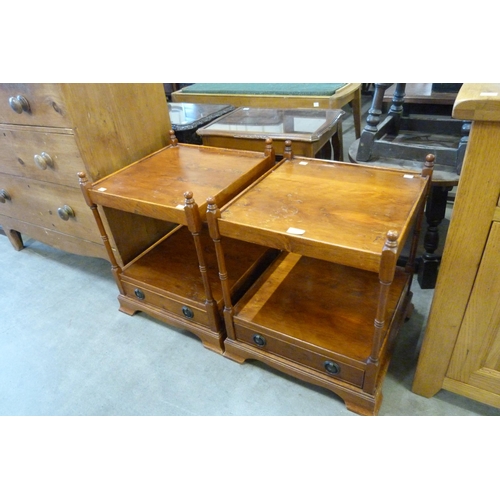 186 - A pair of yew wood night stands