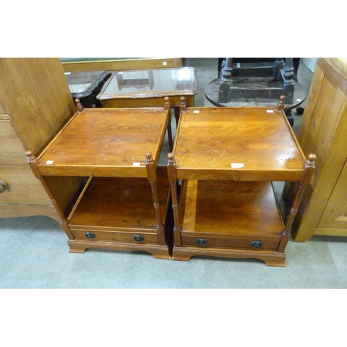 186 - A pair of yew wood night stands