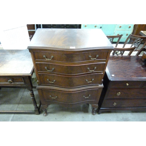 198 - A George I style mahogany serpentine chest on stand