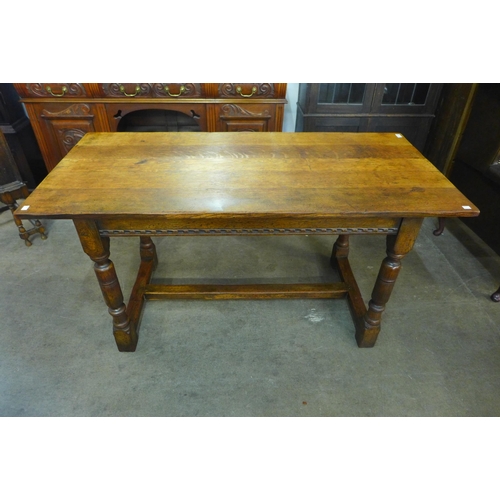 205 - An 18th Century style oak refectory table