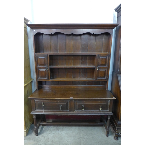 210 - A George II style oak dresser