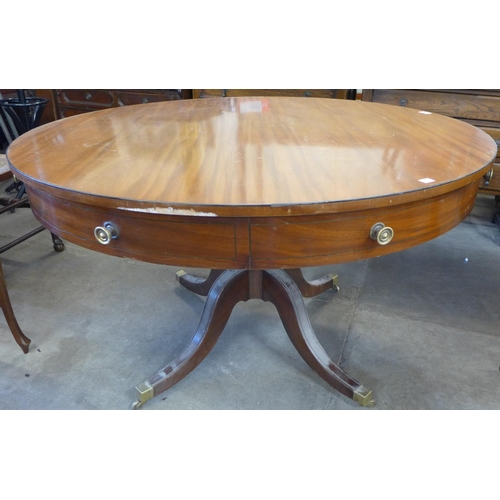 236 - A pair of Regency style mahogany drum shaped library tables