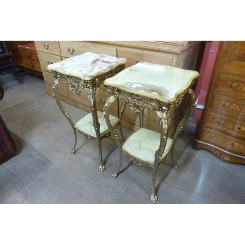 24 - A pair of French gilt metal and onyx two tier etageres