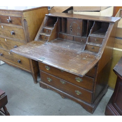 249 - A George II oak bureau