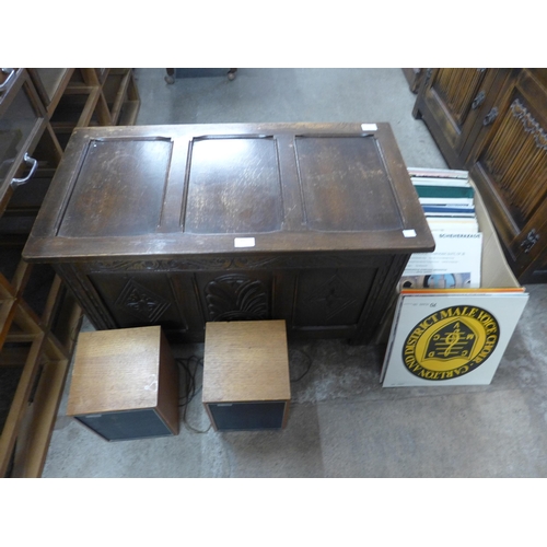 255 - An oak cased Philips turntable, with amplifier and speakers