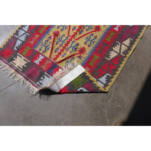 262 - A Turkish Kilim woolen rug