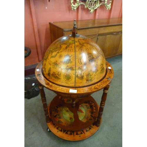 27 - A terrestrial globe cocktail cabinet/trolley