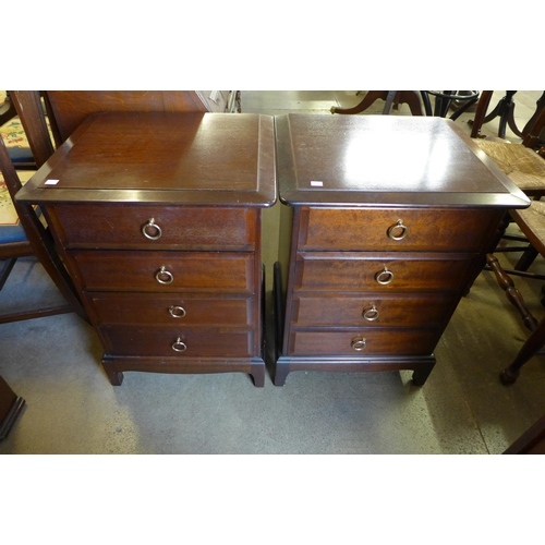 272 - A Stag Minstrel mahogany wardrobe and a pair of bedside chests