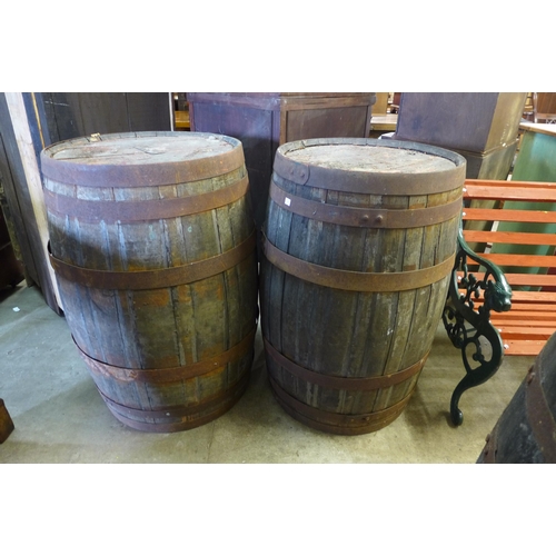 285 - A pair of vintage coopered oak whiskey barrels