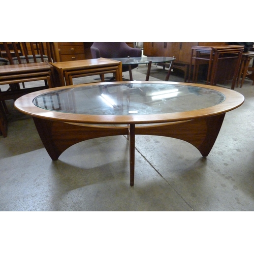 30 - A G-Plan Astro teak and glass topped oval coffee table