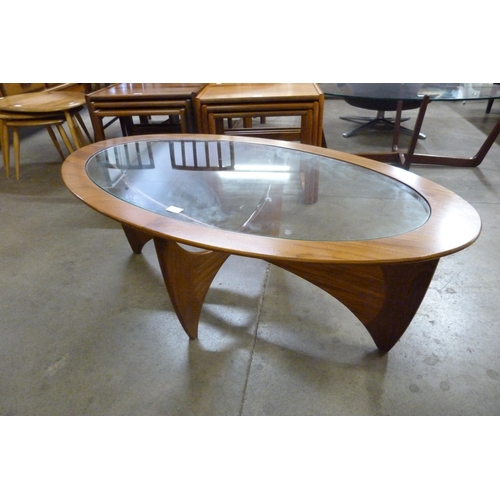 30 - A G-Plan Astro teak and glass topped oval coffee table