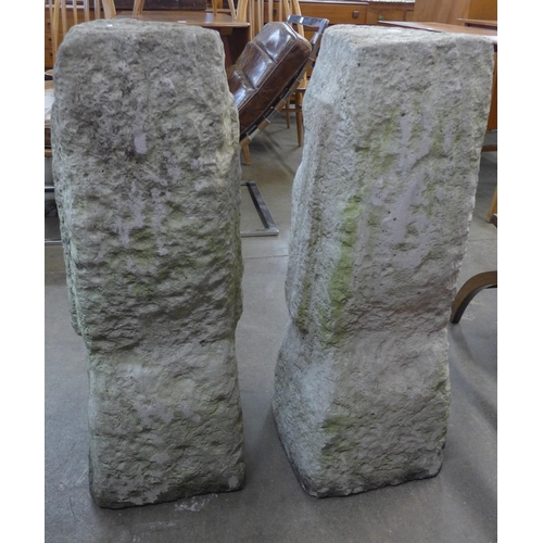 333 - Two large Easter Island style concrete heads