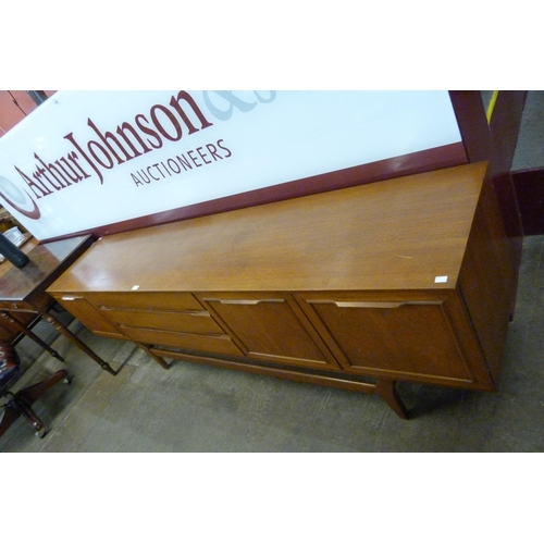 34 - A teak sideboard