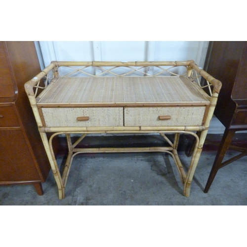 40 - A bamboo and rattan two drawer desk