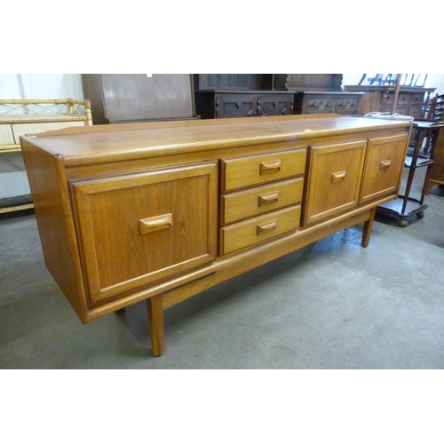 51 - A teak sideboard