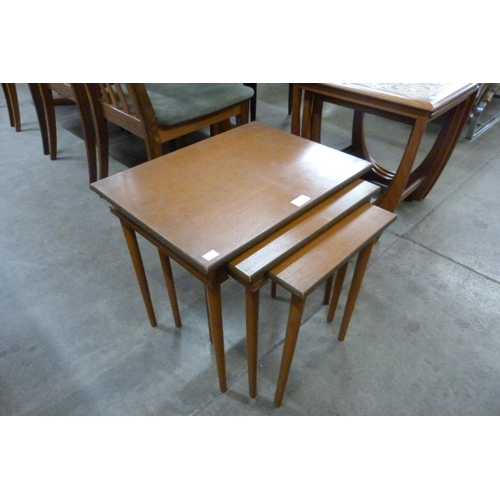 59 - A teak nest of tables