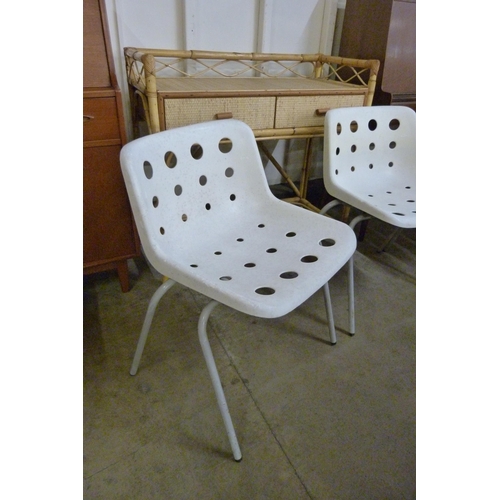 60 - A set of four Hille, Robin Day Design tubular steel and white Perspex Polo stacking chairs