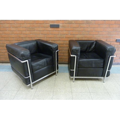 63A - A pair of Bauhaus style black leather and chrome LC2 model armchairs, after Le Corbusier