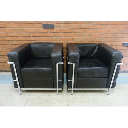 63A - A pair of Bauhaus style black leather and chrome LC2 model armchairs, after Le Corbusier