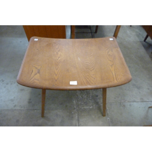 66 - An Ercol elm and beech 265 model side table/table extension