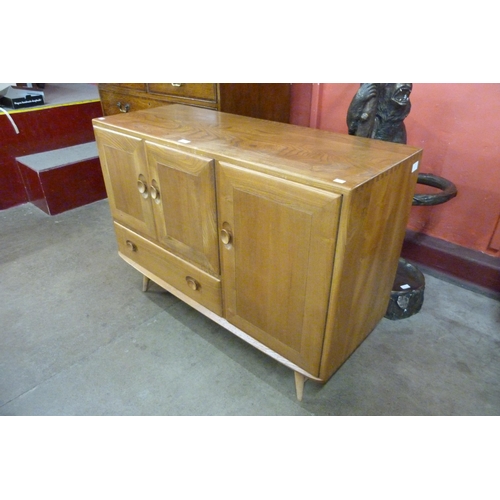 68 - An Ercol Blonde elm and beech sideboard