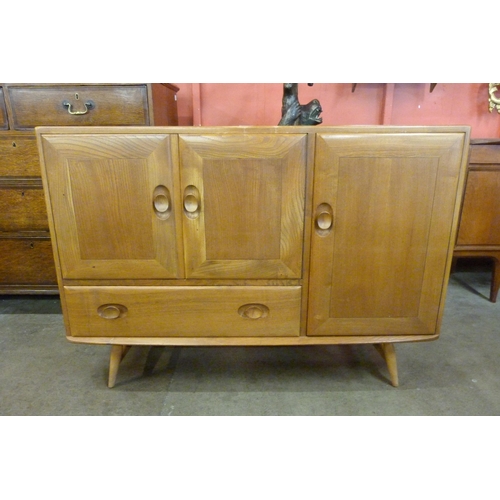 68 - An Ercol Blonde elm and beech sideboard