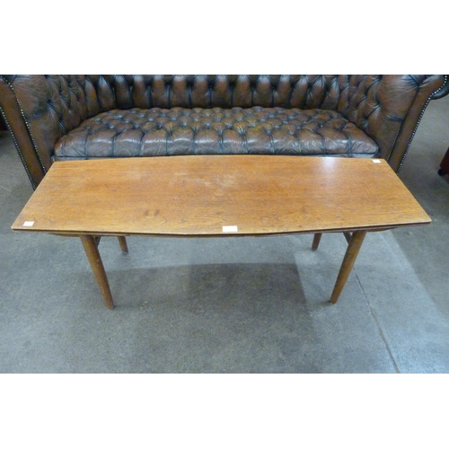 69 - A teak coffee table