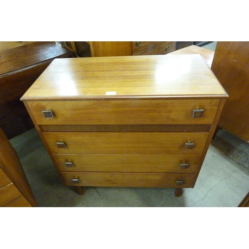 73 - A teak chest of drawers