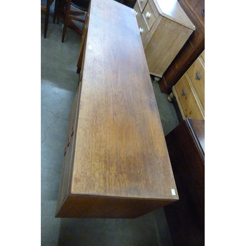 74 - An Alfred Cox teak desk