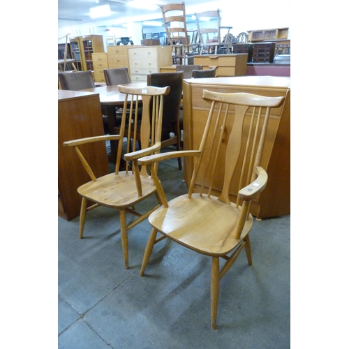 91 - A pair of Ercol style Blonde elm and beech chairs