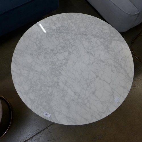 1305 - A marble top circular coffee table