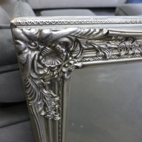 1525 - An antique style silver framed mirror