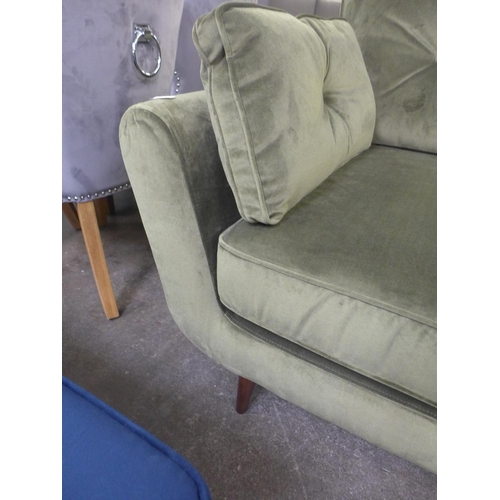 1482 - A moss green velvet two seater sofa