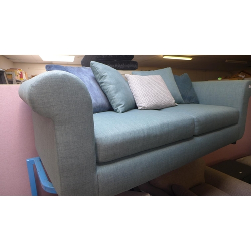 1563 - A quantity of sofas including an aquamarine three seater, a grey armchair, teal corner end section a... 