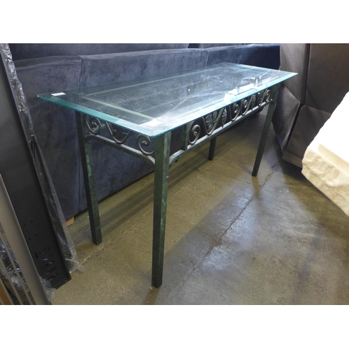 1595 - A green metal and glass top console table