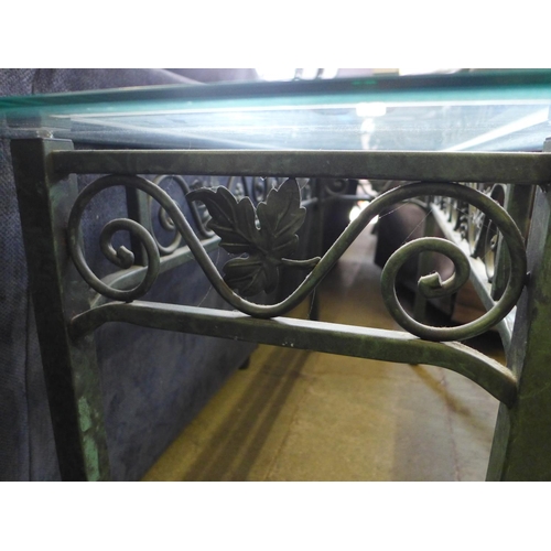 1595 - A green metal and glass top console table