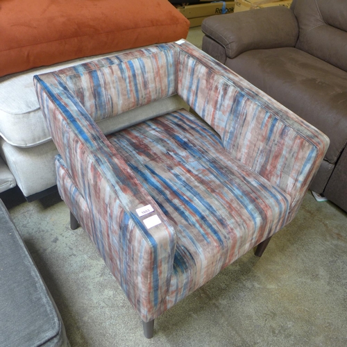 1603 - A red, blue and grey distressed upholstered armchair