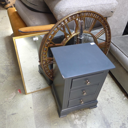 1606 - A skeleton clock, a gold mirror and a chest