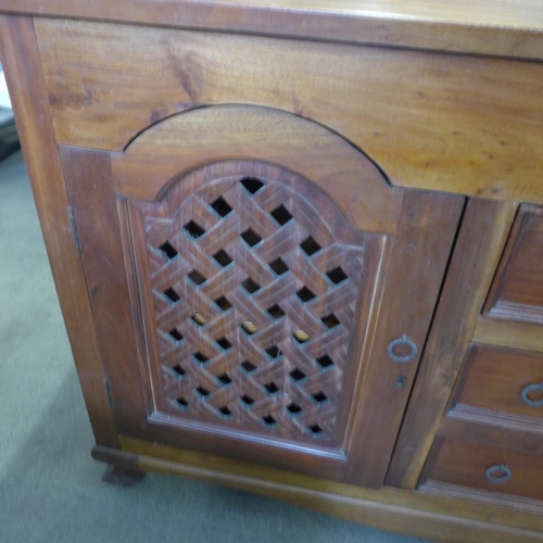 1611 - A dark stained hardwood two door three drawer sideboard