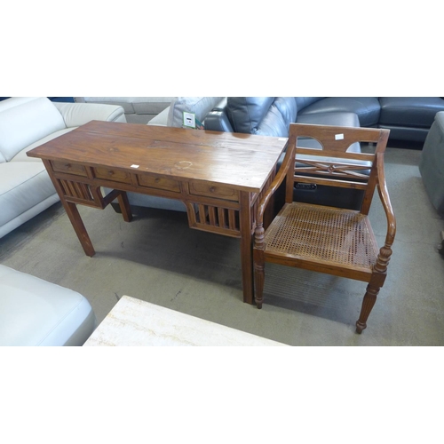 1613 - An oak four drawer hardwood desk and matching chair