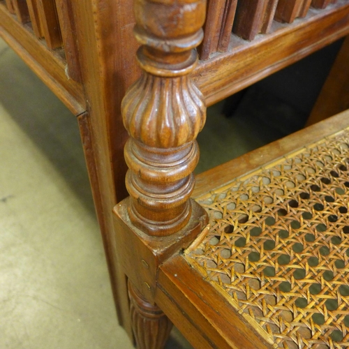 1613 - An oak four drawer hardwood desk and matching chair