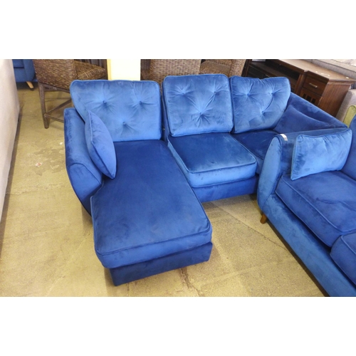 1635 - A pair of Hoxton LHF and RHF deep blue velvet corner sofas -one damaged