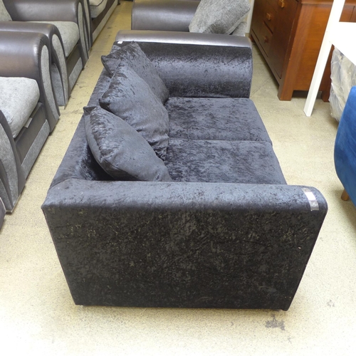 1650 - A black crushed velvet two seater sofa