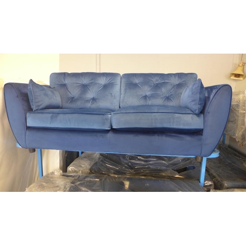 1653 - A Hoxton deep ocean blue velvet three seater sofa